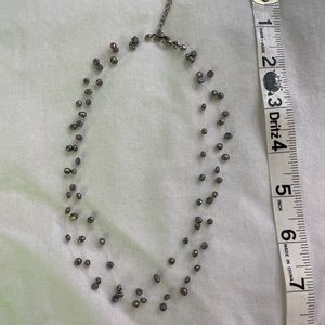 Classic three-tiered gray pearl necklace.  Costume jewelry purchased in Hawaii.